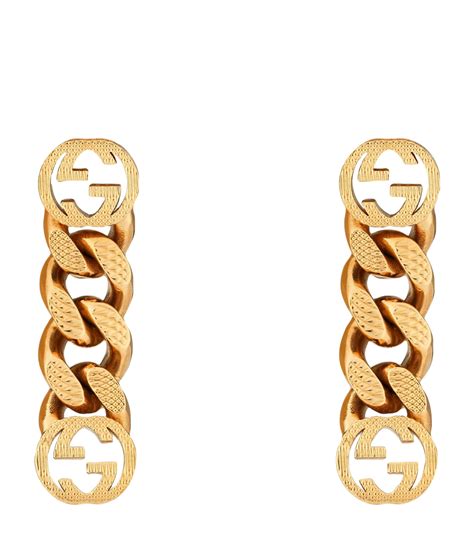 gucci earrings with interlocking g pendant|gucci g motif earrings.